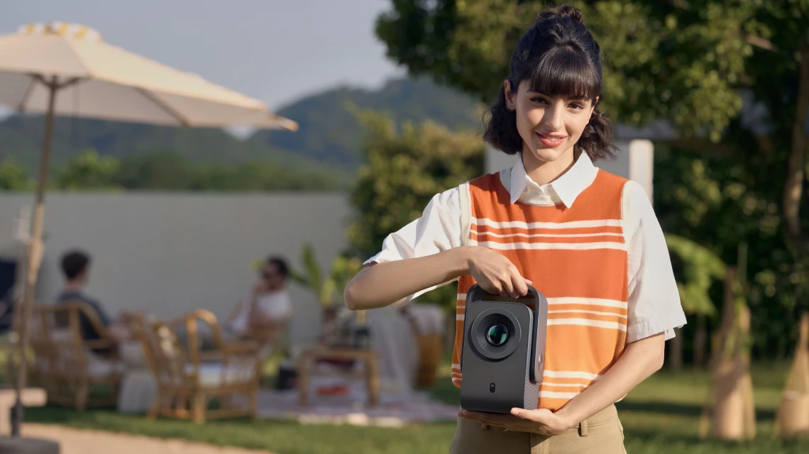 TCL Projector in hand